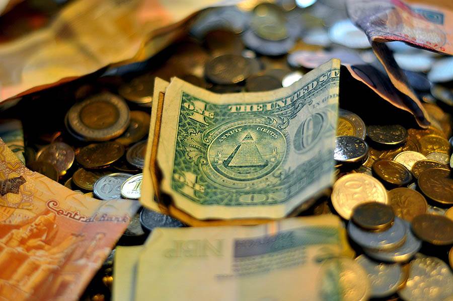 Dollar and other currencies in cash.